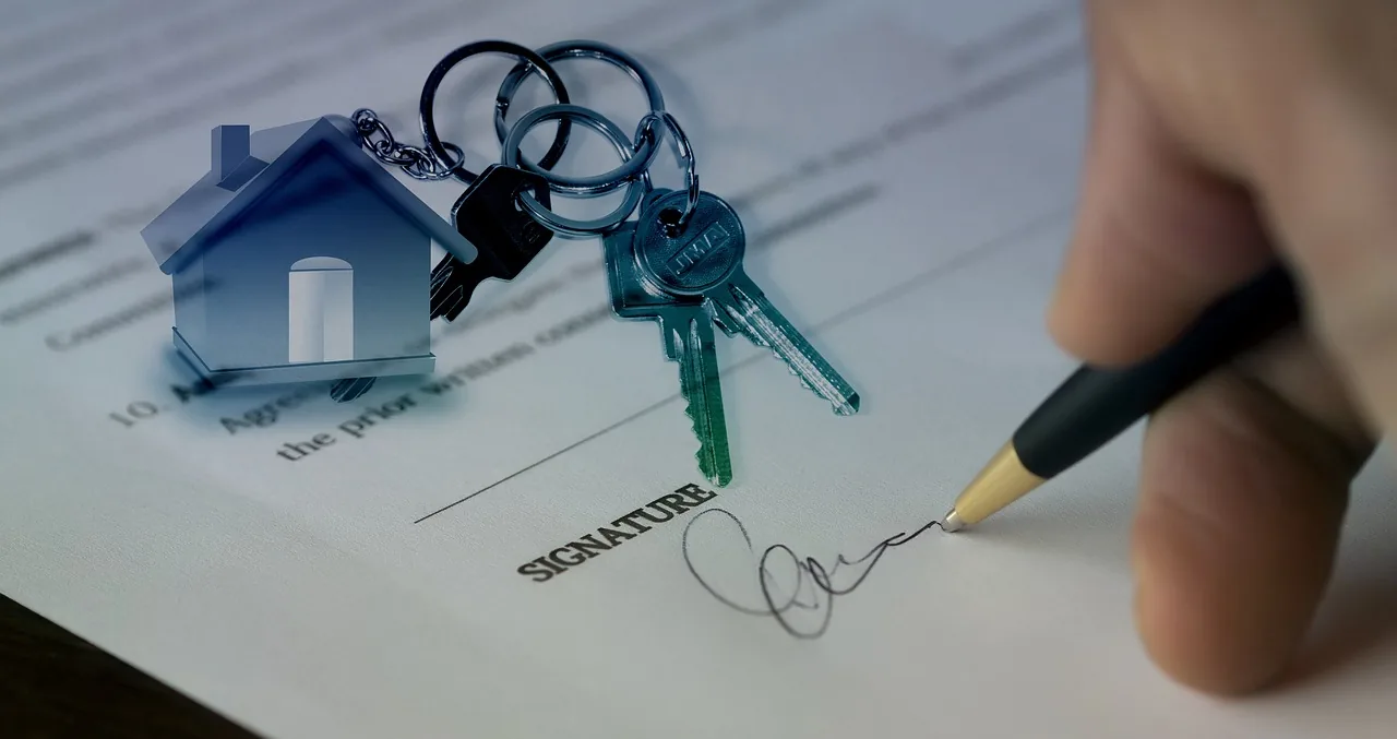 Happy homeowners shaking hands